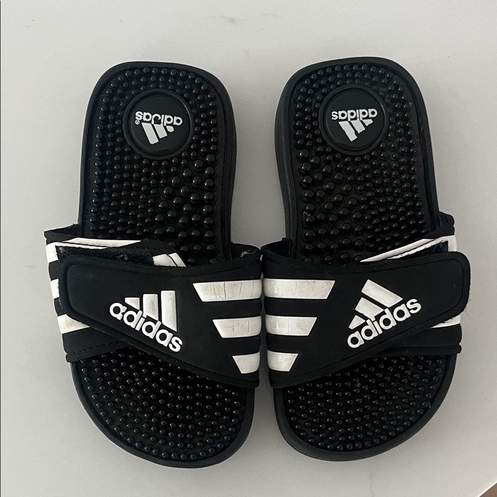 Kids size 11 Adidas slides